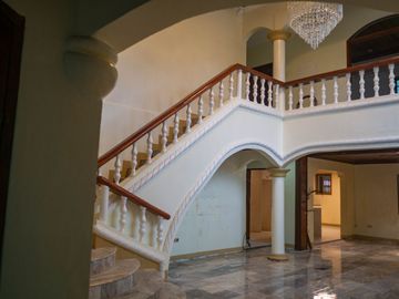 Beautiful Spanish Style 4 BR/4Bath home in a fully enclosed gated property
