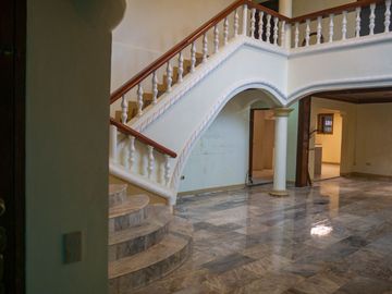 Beautiful Spanish Style 4 BR/4Bath home in a fully enclosed gated property
