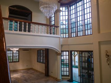 Beautiful Spanish Style 4 BR/4Bath home in a fully enclosed gated property