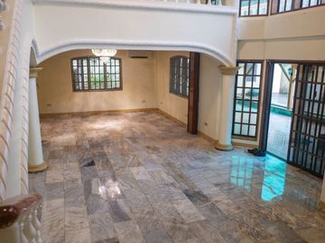 Beautiful Spanish Style 4 BR/4Bath home in a fully enclosed gated property