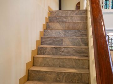 Beautiful Spanish Style 4 BR/4Bath home in a fully enclosed gated property