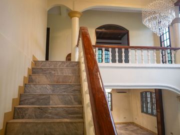 Beautiful Spanish Style 4 BR/4Bath home in a fully enclosed gated property