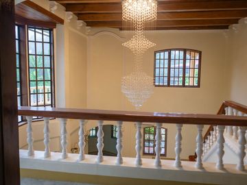 Beautiful Spanish Style 4 BR/4Bath home in a fully enclosed gated property