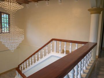 Beautiful Spanish Style 4 BR/4Bath home in a fully enclosed gated property