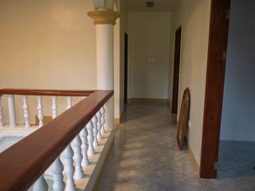 Beautiful Spanish Style 4 BR/4Bath home in a fully enclosed gated property