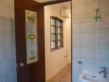Beautiful Spanish Style 4 BR/4Bath home in a fully enclosed gated property