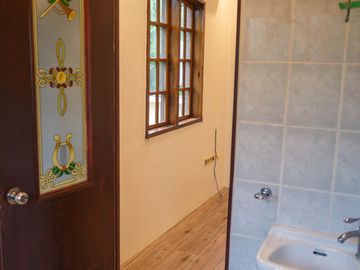 Beautiful Spanish Style 4 BR/4Bath home in a fully enclosed gated property