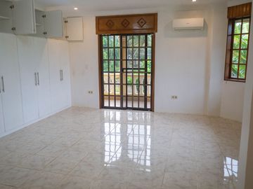 Beautiful Spanish Style 4 BR/4Bath home in a fully enclosed gated property