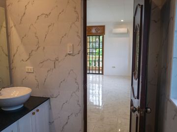 Beautiful Spanish Style 4 BR/4Bath home in a fully enclosed gated property
