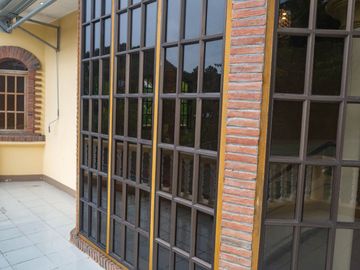 Beautiful Spanish Style 4 BR/4Bath home in a fully enclosed gated property