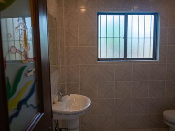 Beautiful Spanish Style 4 BR/4Bath home in a fully enclosed gated property