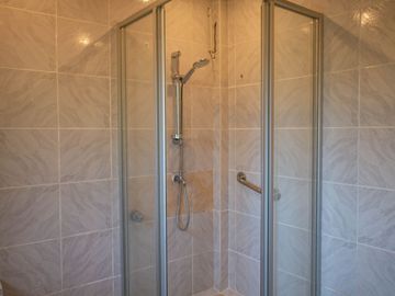Beautiful Spanish Style 4 BR/4Bath home in a fully enclosed gated property