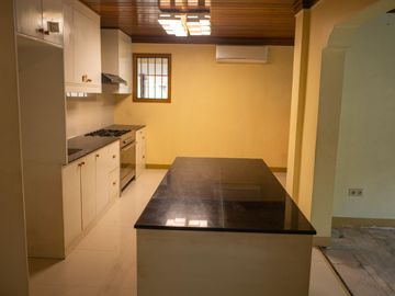 Beautiful Spanish Style 4 BR/4Bath home in a fully enclosed gated property