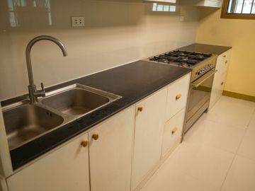 Beautiful Spanish Style 4 BR/4Bath home in a fully enclosed gated property