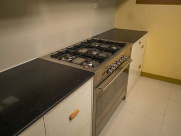 Beautiful Spanish Style 4 BR/4Bath home in a fully enclosed gated property