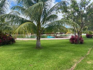 Casa con alberca privada, doble altura, pisos de mármol, en venta en Residencial Rio, Cancun