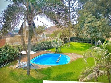 Ocasión!! Venta Casa de Ensueño con amplios Jardines, Piscina y Bungalow en Urb. San Fernando de Pachacamac