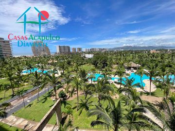 Dpartamento en renta vacacional con terraza, vista a las albercas y áreas comunes
