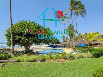 Depa de playa con terraza y vista frontal al mar
