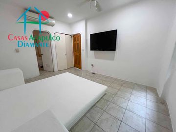 Departamento con terraza, vista al mar, acceso directo a la alberca y jardines