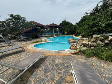 A Spacious Detached House with 2 Beds 2 Baths in the Perfect Location in Project directly across Mae Ramphueng Beach