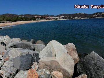 Departamento de 2 recamaras en venta en condominio Palacio Huatulco en la zona hotelera Tangolunda, Huatulco, Oaxaca, México
