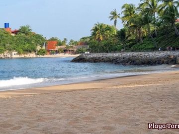 Departamento de 2 recamaras en venta en condominio Palacio Huatulco en la zona hotelera Tangolunda, Huatulco, Oaxaca, México