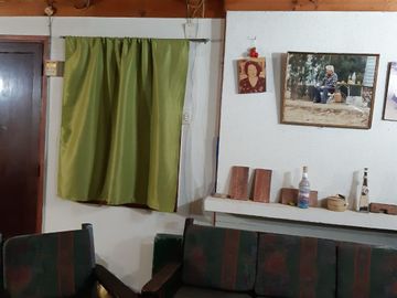 PARCELA CON CASA A ORILLA DE LAGO RAPEL