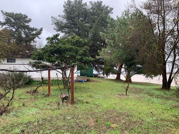 PARCELA CON CASA A ORILLA DE LAGO RAPEL