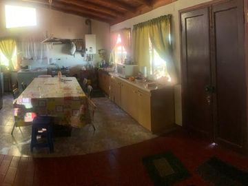 PARCELA CON CASA A ORILLA DE LAGO RAPEL