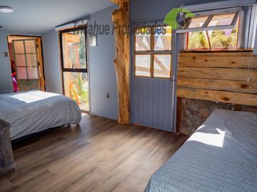 Terreno de 6.000 m2 con linda casa , cabaña y orilla de río, Cochiguaz, Valle del Elqui. $220 millones
