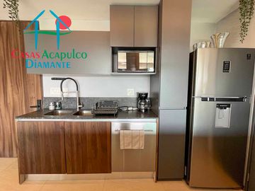 Departamento en condominio de playa. Con terraza y vista a las áreas comunes