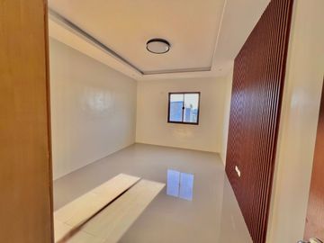 Discover contemporary luxury in this brand new three-story duplex house and lot, perfectly situated in the esteemed Greenwoods Executive Village.