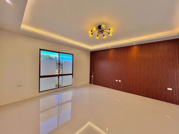Discover contemporary luxury in this brand new three-story duplex house and lot, perfectly situated in the esteemed Greenwoods Executive Village.