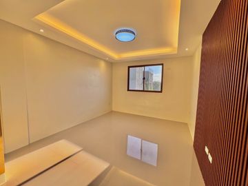 Discover contemporary luxury in this brand new three-story duplex house and lot, perfectly situated in the esteemed Greenwoods Executive Village.