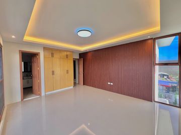 Discover contemporary luxury in this brand new three-story duplex house and lot, perfectly situated in the esteemed Greenwoods Executive Village.