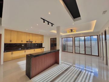 Discover contemporary luxury in this brand new three-story duplex house and lot, perfectly situated in the esteemed Greenwoods Executive Village.