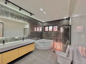 Experience luxury living in this brand new corner house and lot complete with a pool, nestled within the prestigious Greenwoods Executive Village