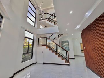 Experience luxury living in this brand new corner house and lot complete with a pool, nestled within the prestigious Greenwoods Executive Village