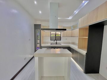 Experience luxury living in this brand new corner house and lot complete with a pool, nestled within the prestigious Greenwoods Executive Village