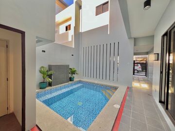 Experience luxury living in this brand new corner house and lot complete with a pool, nestled within the prestigious Greenwoods Executive Village