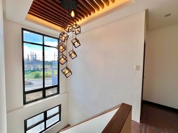 Embrace the charm of modern living in this brand new single detached house and lot nestled within the prestigious Greenwoods Executive Village