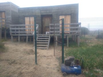 Vendo Terreno con Dos Cabañas en sector iloca
