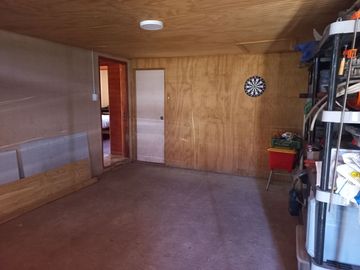 Nogales, en venta parcela plana de 5000 mts con casa sólida y urbanización completa.