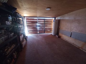 Nogales, en venta parcela plana de 5000 mts con casa sólida y urbanización completa.