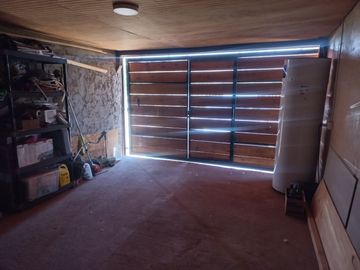 Nogales, en venta parcela plana de 5000 mts con casa sólida y urbanización completa.