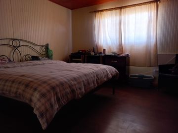 Nogales, en venta parcela plana de 5000 mts con casa sólida y urbanización completa.