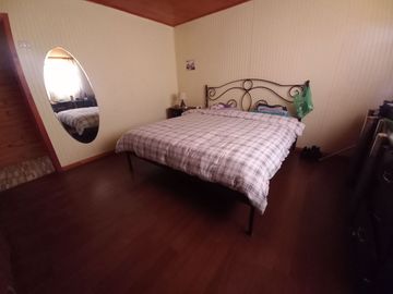 Nogales, en venta parcela plana de 5000 mts con casa sólida y urbanización completa.