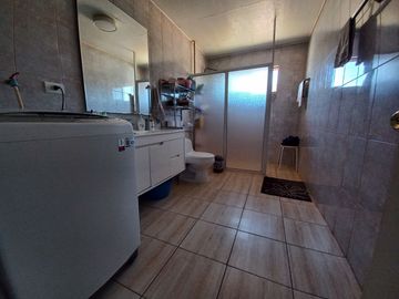 Nogales, en venta parcela plana de 5000 mts con casa sólida y urbanización completa.