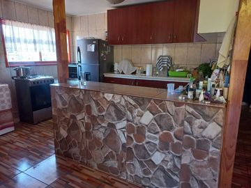 Nogales, en venta parcela plana de 5000 mts con casa sólida y urbanización completa.